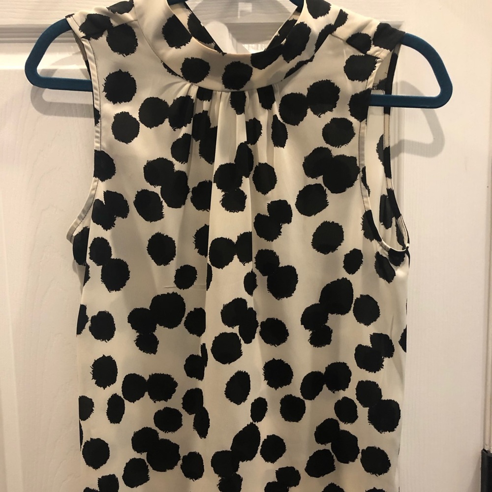 Sleeveless mock turtle blouse